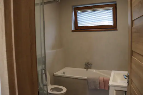 Apartmán Valet New — obývací část s gaučem